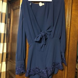 Blue romper w/ slits in sleeves
